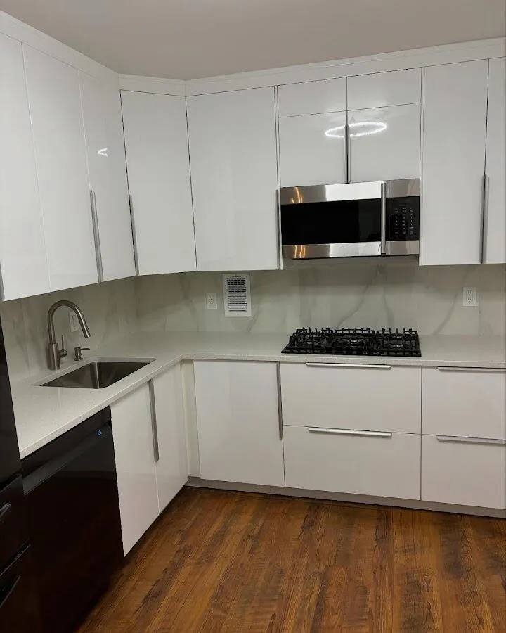 Restored kitchen with white cabinets after water damage in Anthony